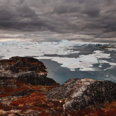 greenland-icebergs-autumn-sea-dark-sky