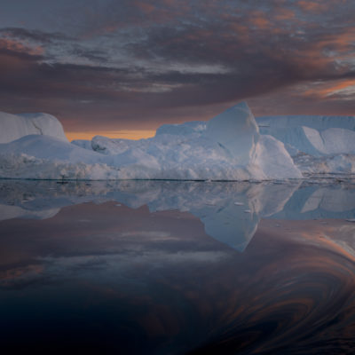 greenland-iceberg-whirpool-colorful-darksea