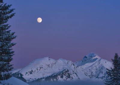 moon-sunset-purple-sky-mountains-snow